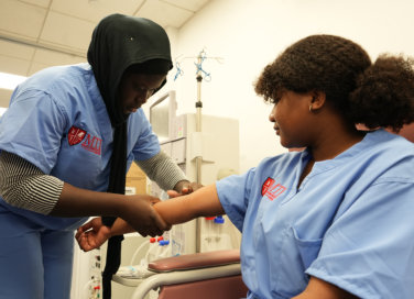 clinic staff and patient