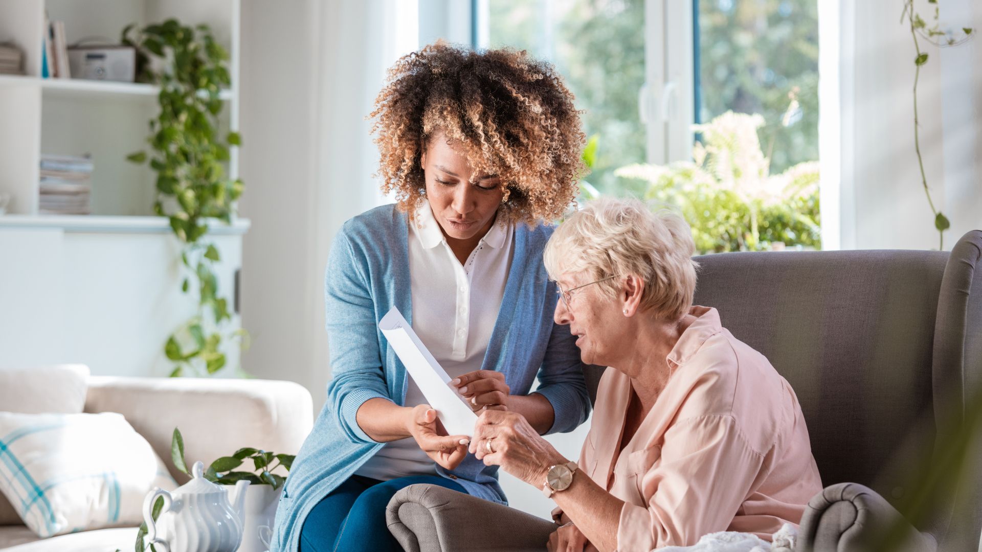 Woman talking with older woman